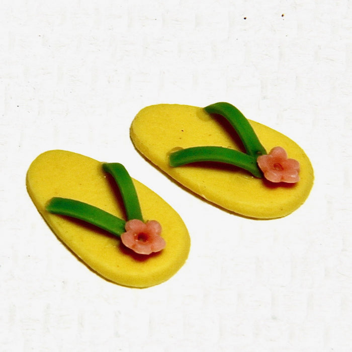 Flip flops, blomsterdekoration, gul