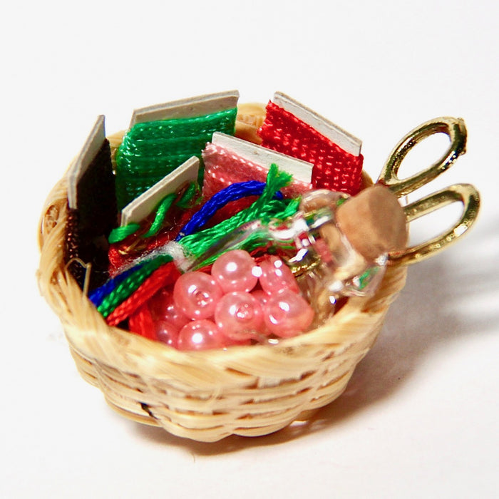 Sewing supplies and scissors in a basket