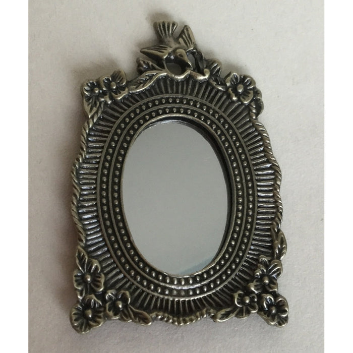 Mirror, antique patinated metal, oval, 4.2 x 6.4 cm