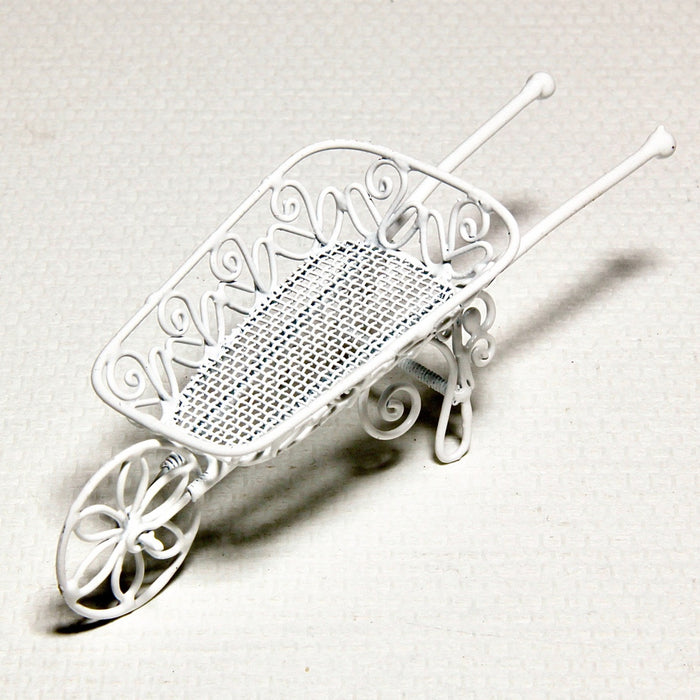 Wheelbarrow made of white iron wire