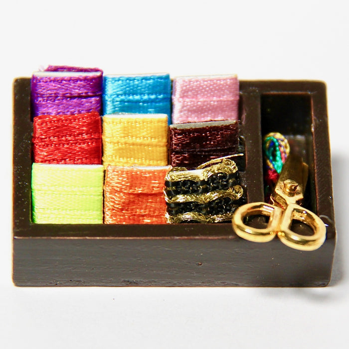 Silk ribbons and scissors in a box