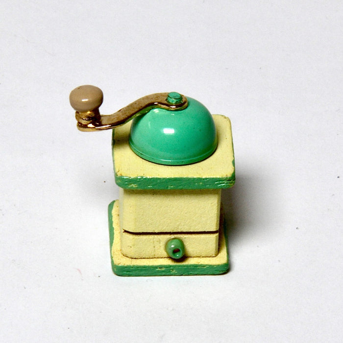 Coffee grinder, yellow green, 'working'