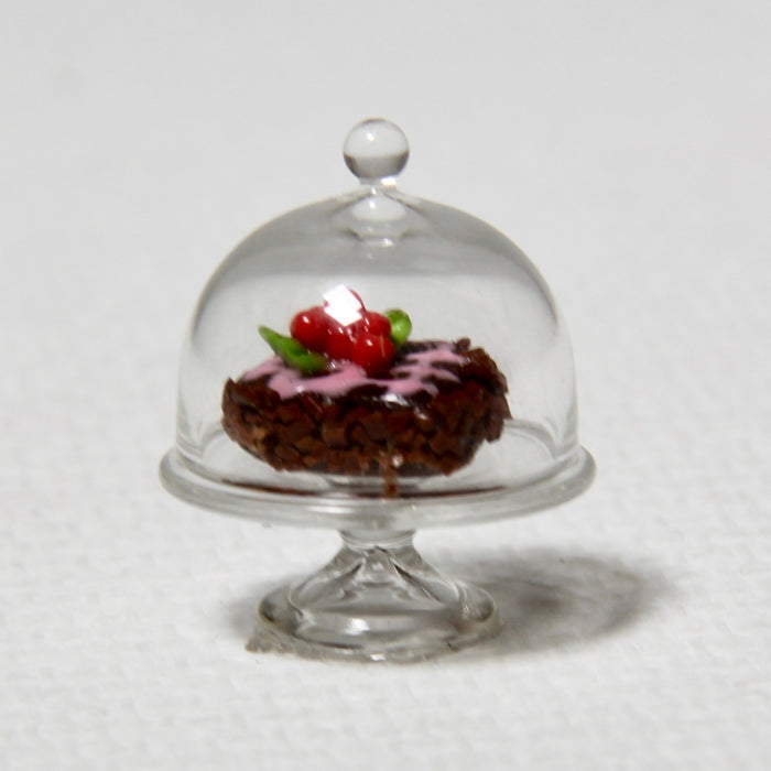 Heart chocolate cake in a serving dish, small, with a top