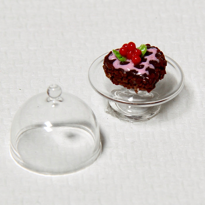 Heart chocolate cake in a serving dish, small, with a top