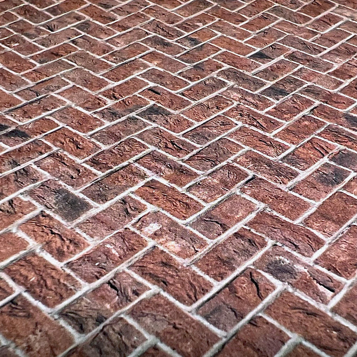 Brun tegelsten, fiskbensmönster, präglad kartong