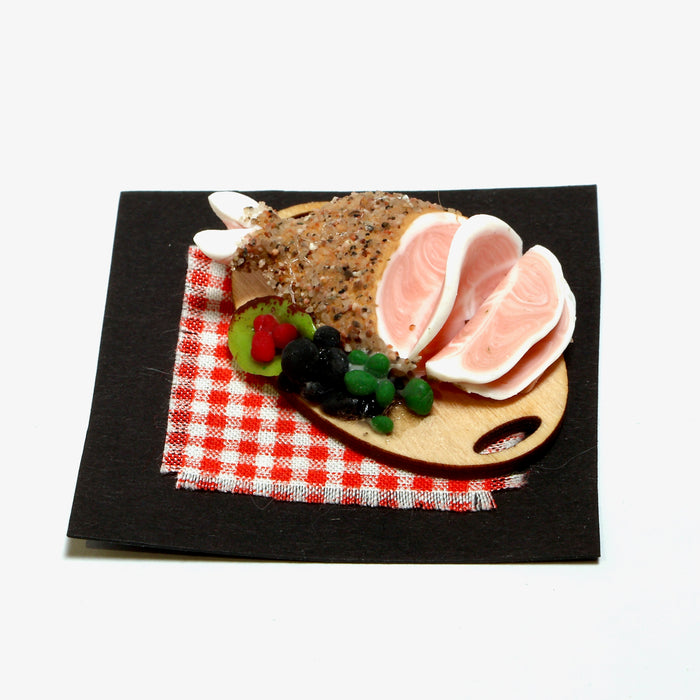 Christmas ham on a wooden tray, Finnish