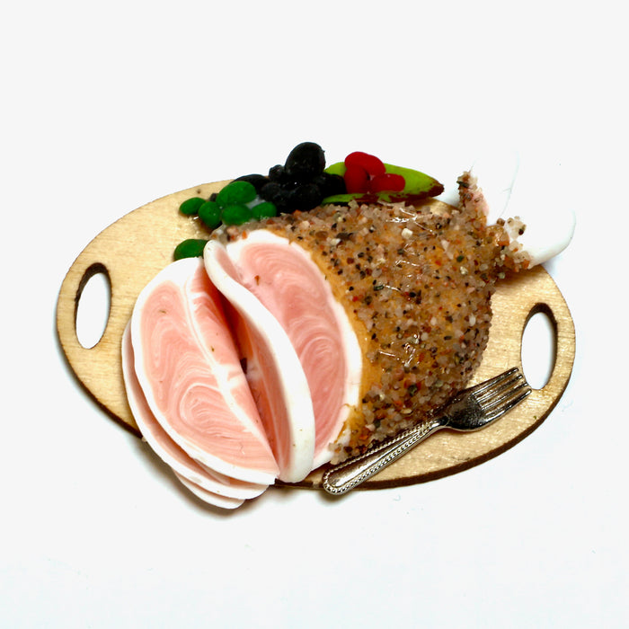 Christmas ham on a wooden tray, Finnish