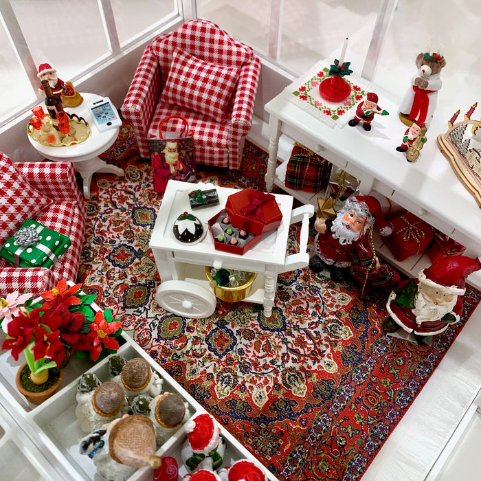 Pieni joulukauppa kasvihuoneessa.