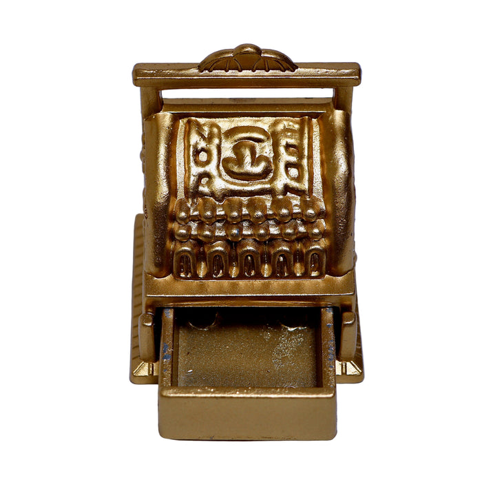 kullanvärinen kassakone.