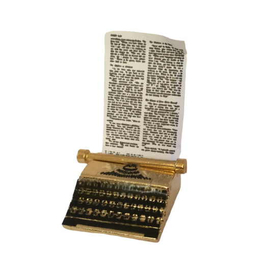 Pieni kirjoituskone.