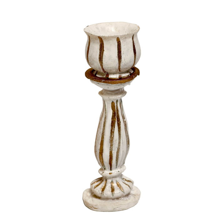 Pieni pylväs ja ruukku.