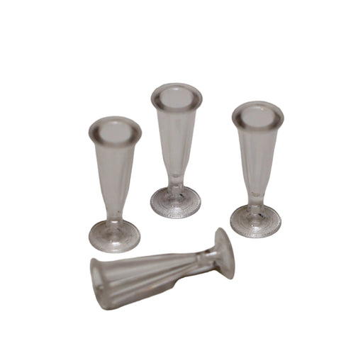 Pienet shampanjalasit muovia.