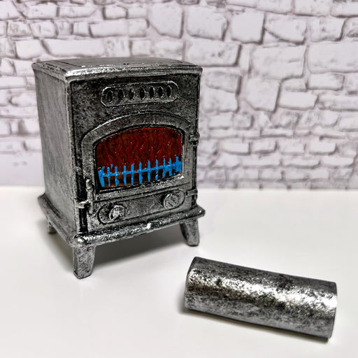 tonttutalon kamina ja piippu.