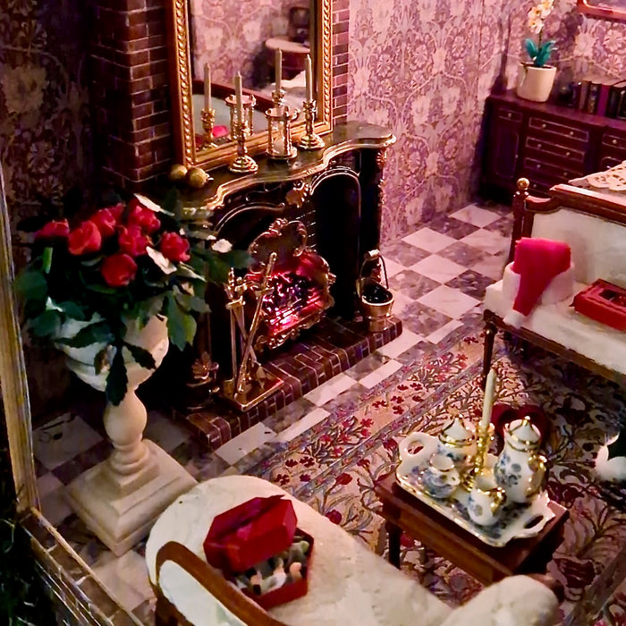 Ylellinen olohuone nukkekodissa.