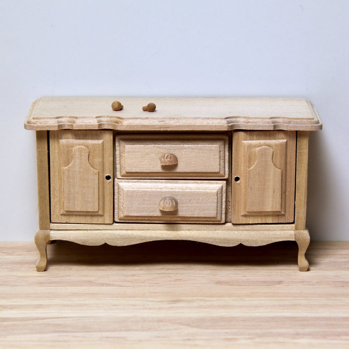 Chest of drawers, sideboard, finished in wood