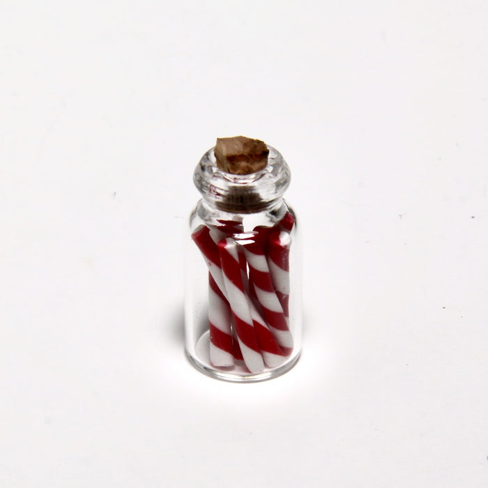 Candy bars in a glass jar, red and white