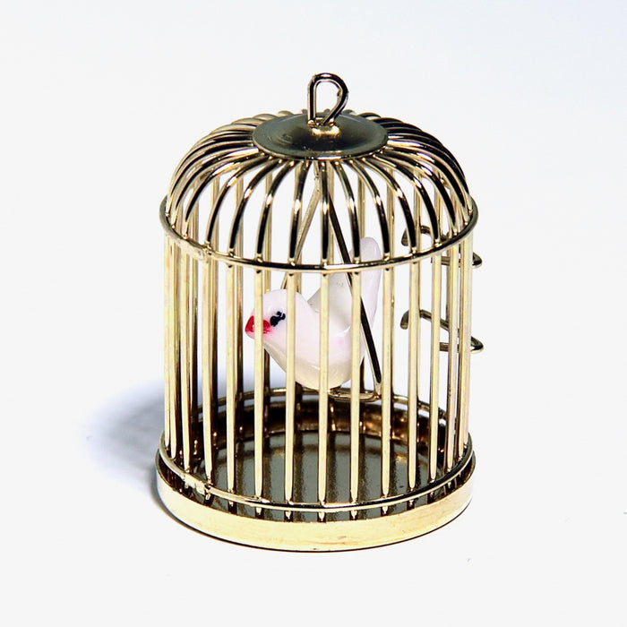 Bird and birdcage, brass