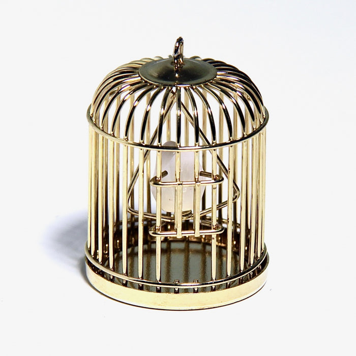 Bird and birdcage, brass