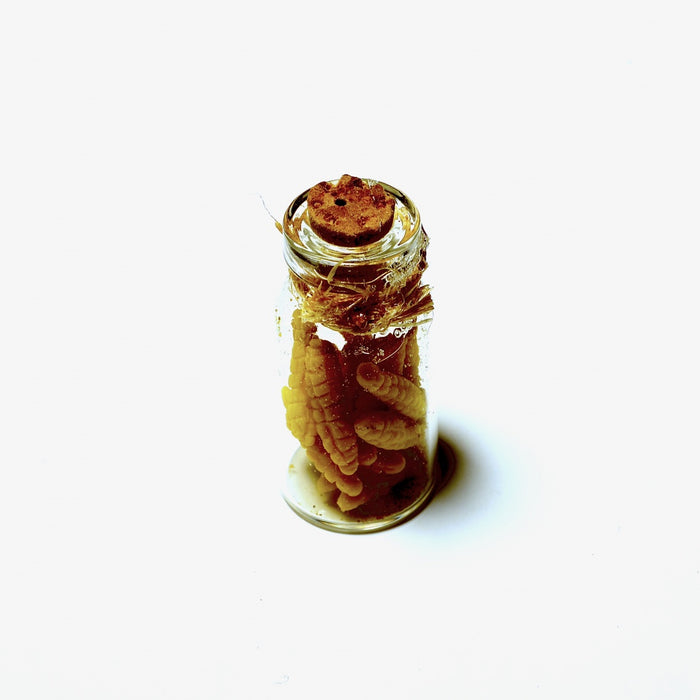 Vegetables in a glass jar, corn