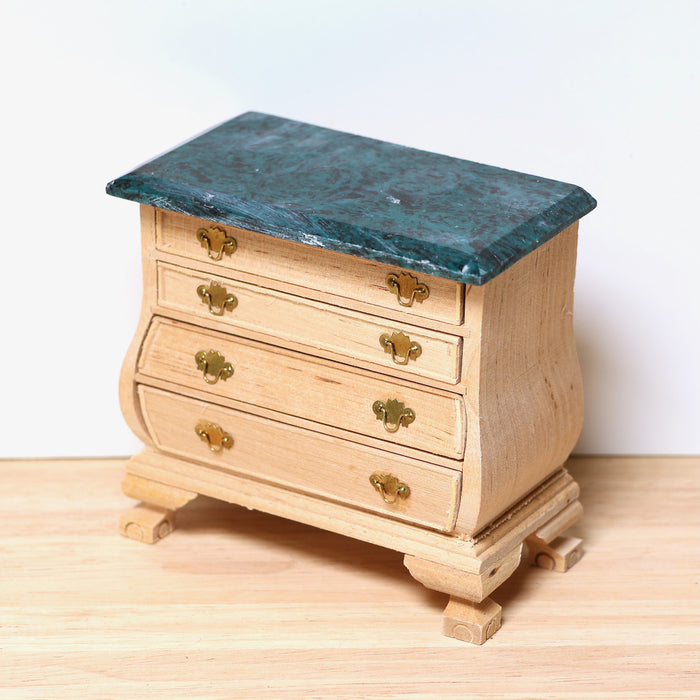 Chest of drawers, marble top, finished in wood