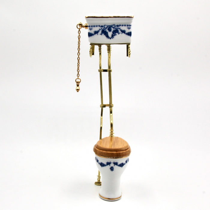 Old-time toilet bowl, tall, blue bow
