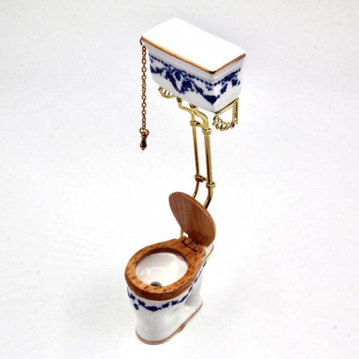 Old-time toilet bowl, tall, blue bow