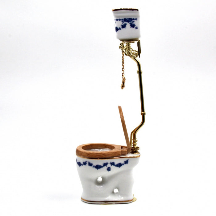 Old-time toilet bowl, tall, blue bow