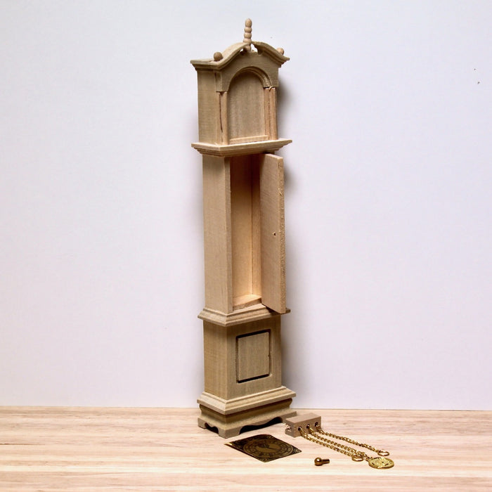 Cabinet clock, finished in wood