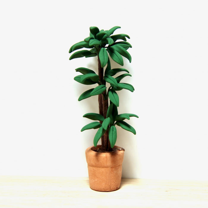 Green plant, palm in a clay pot, 8-9 cm