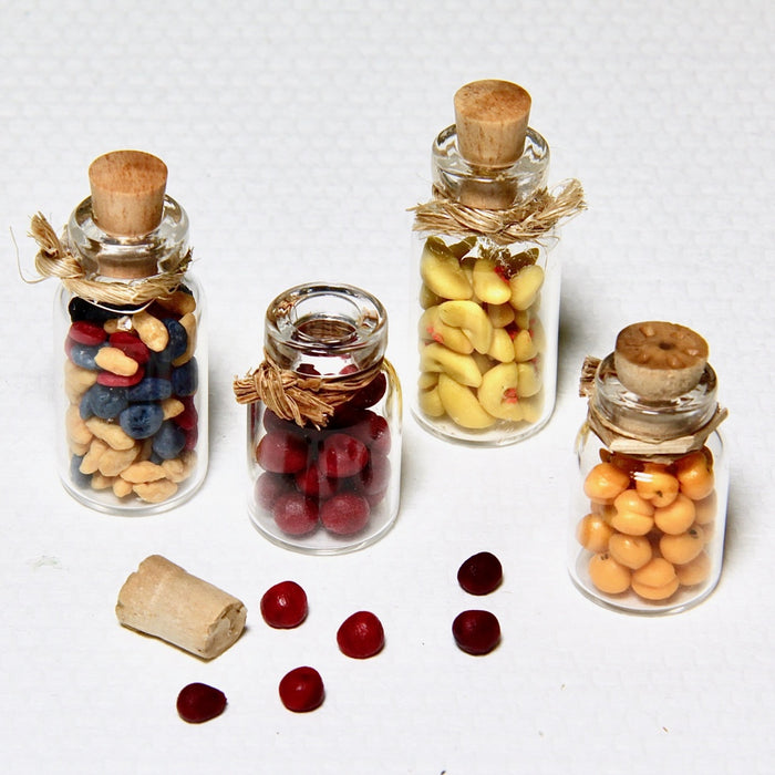 Dried red plums in a glass jar