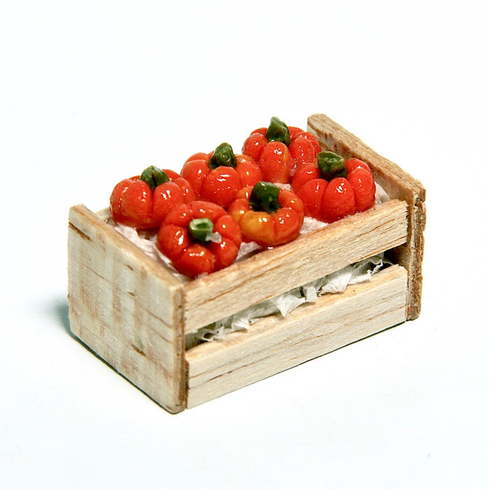 Pumpkins in a wooden box