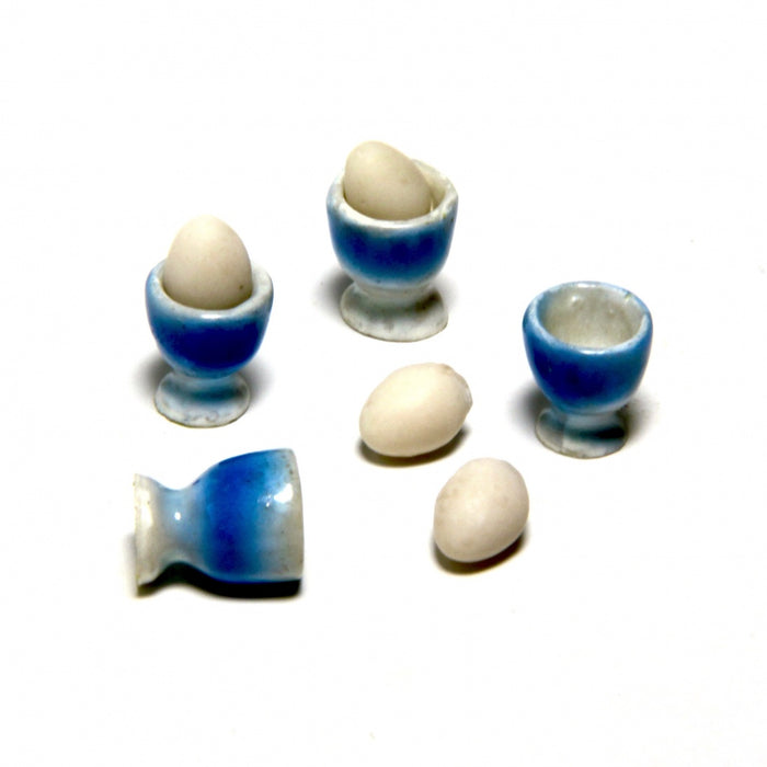 Egg cups and eggs, 8 parts