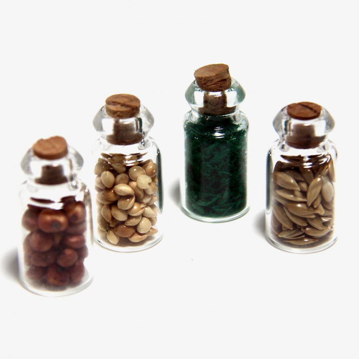 Spices and nuts in a glass jar, 4 pcs