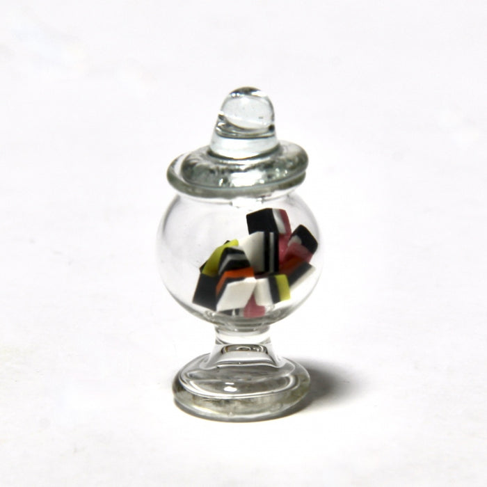 English varnishes in a glass jar, glass lid