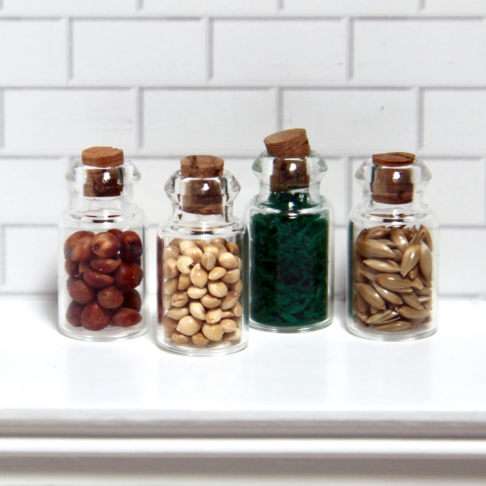 Spices and nuts in a glass jar, 4 pcs