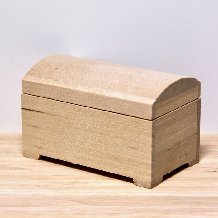 Casket, curved lid, finished in wood