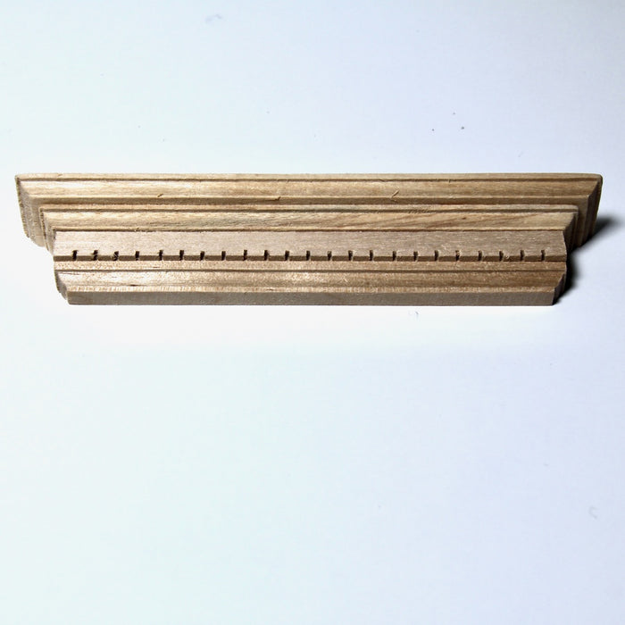 Pediment with decorative cutouts, 3 pieces, finished in wood