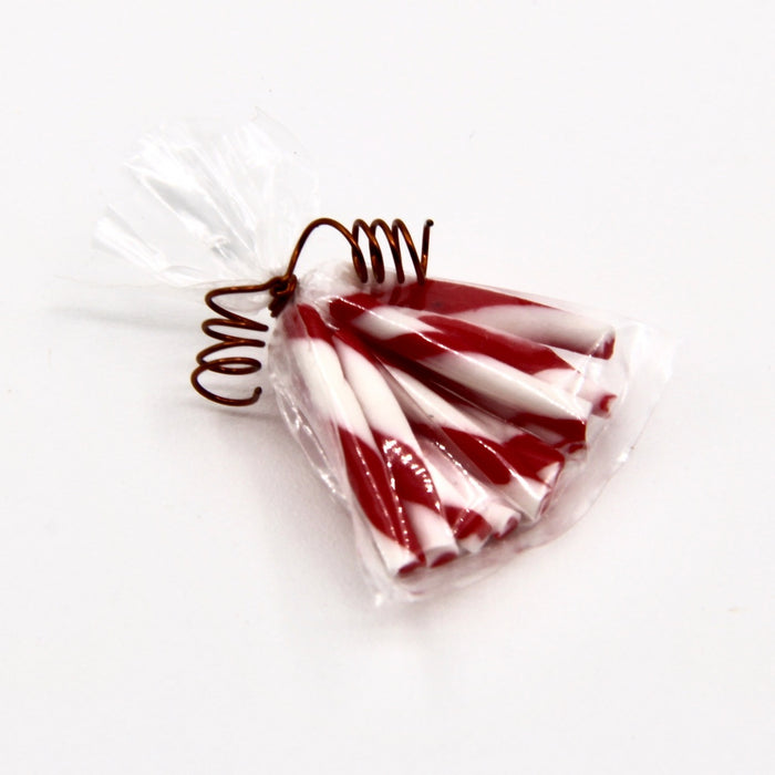 Polka sweets in a cellophane bag, red-white