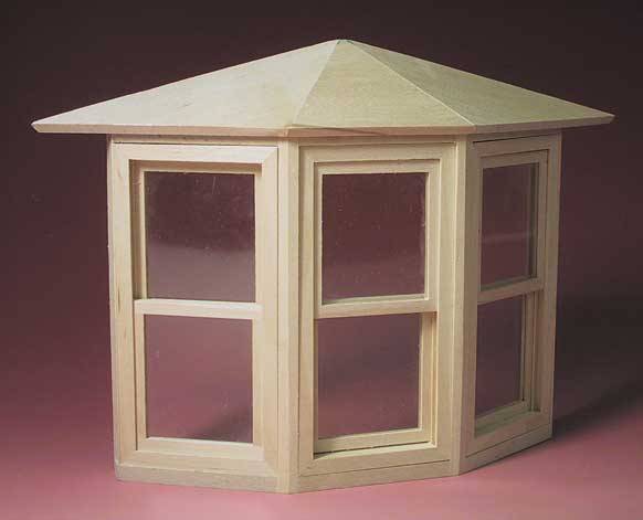 Bay window, opening windows, finished in wood