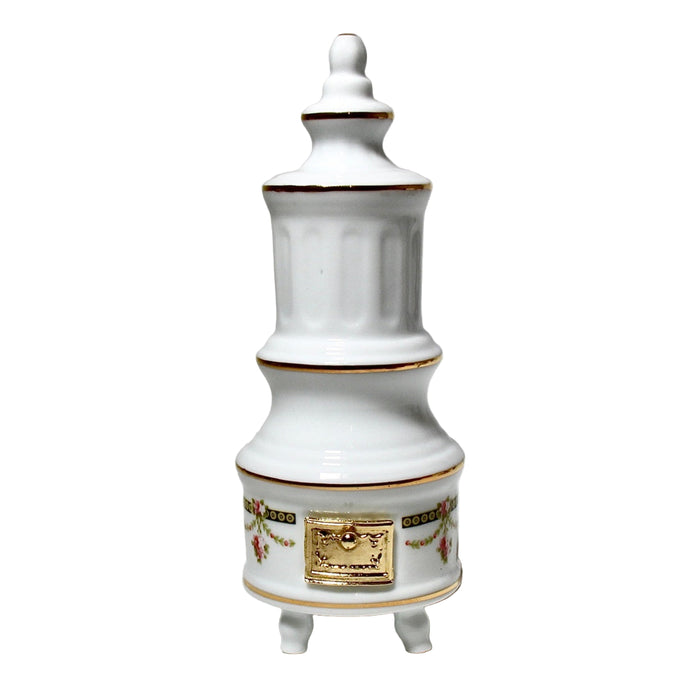 Posliinikamiina nukkekotiin. 